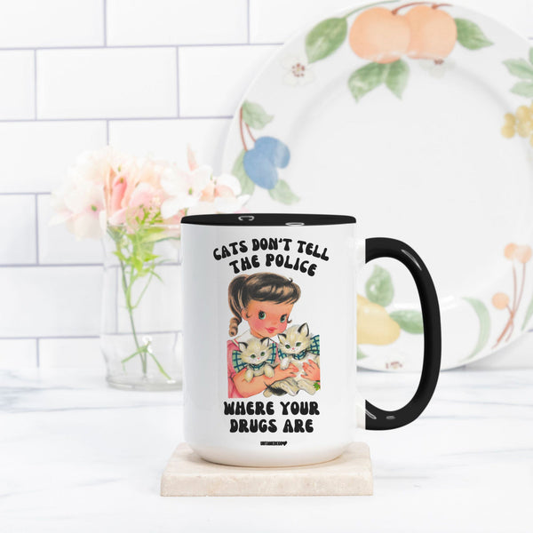 Cats Don't Tell The Police Mug